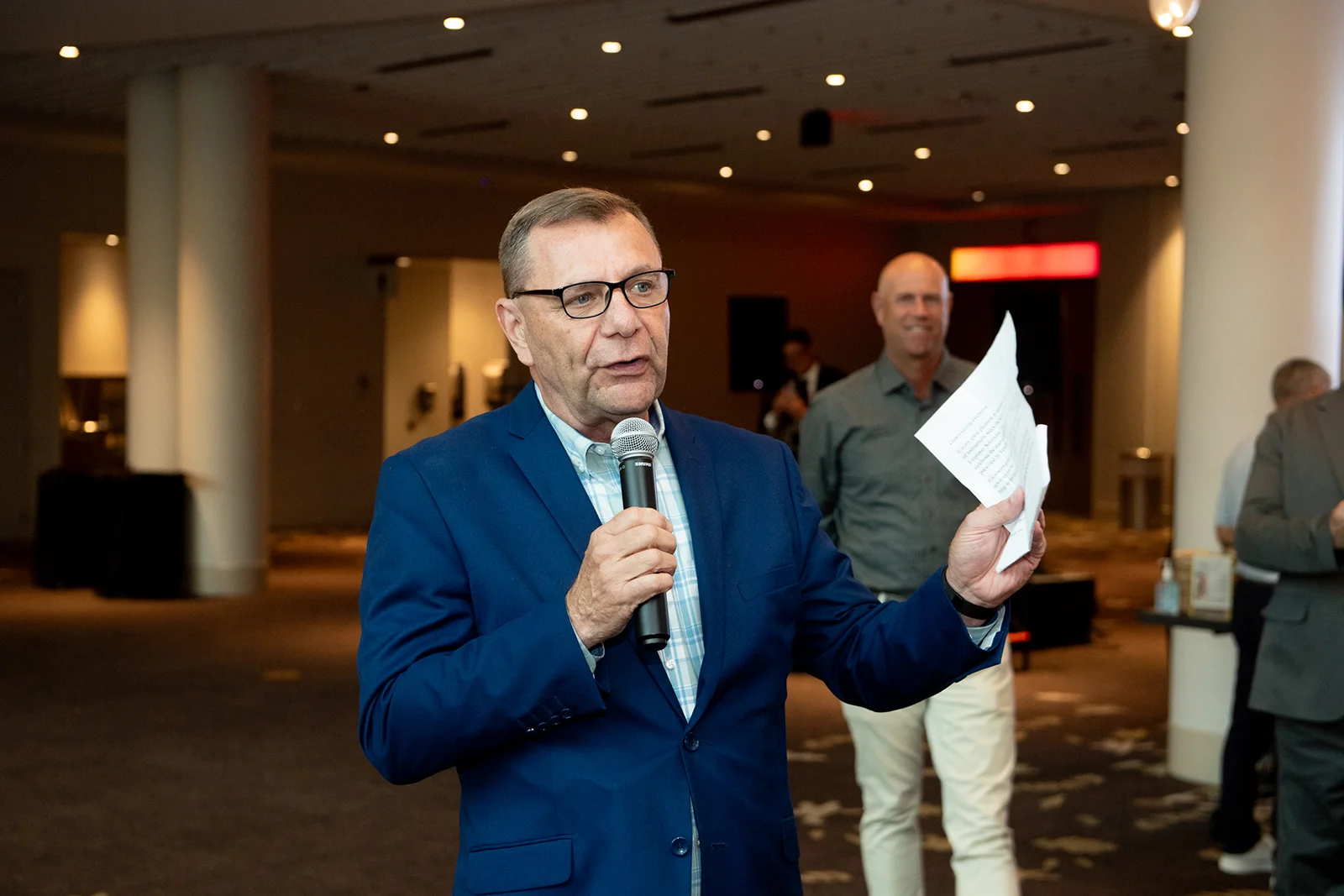 Stan Hall speaking at a community event